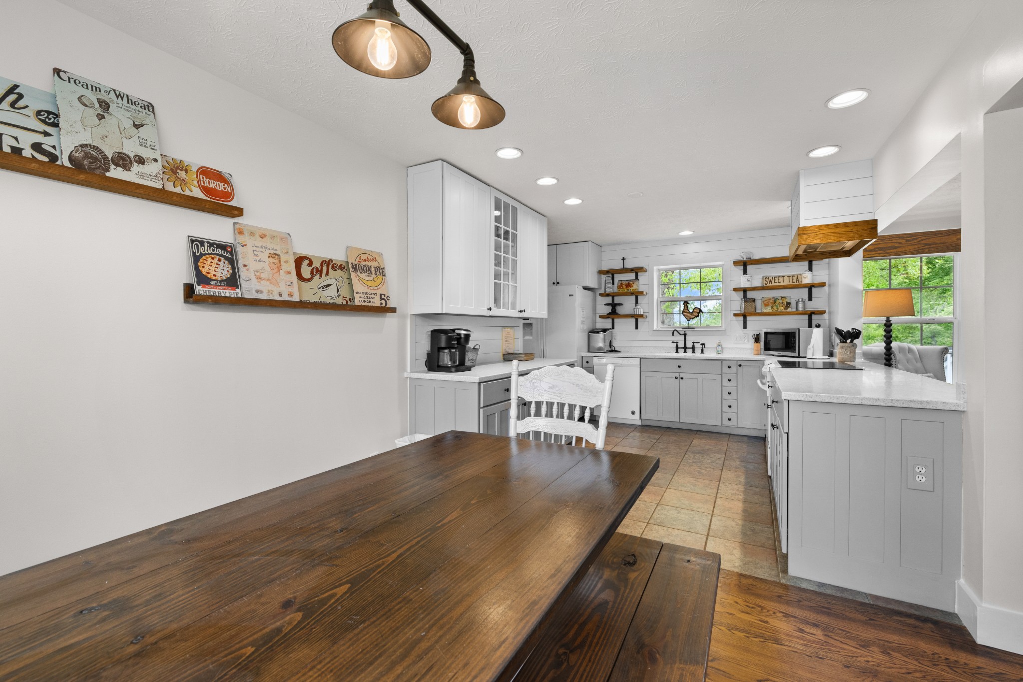 1249 Gulf Road Spencer, TN 38585 - Photo 85 of 98 a living room with stainless steel appliances furniture wooden floor and a kitchen view