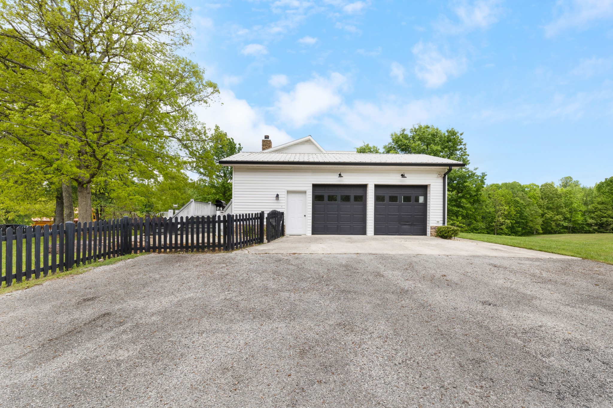 1249 Gulf Road Spencer, TN 38585 - Photo 96 of 98 a view of a house with a small yard and a large tree