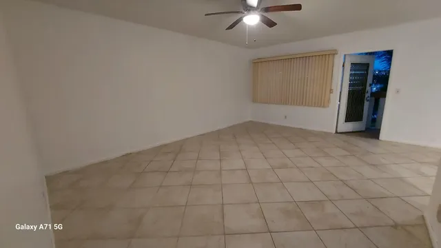 en empty room with windows