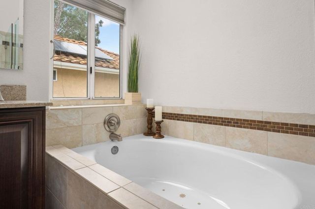 a bathroom with a bathtub