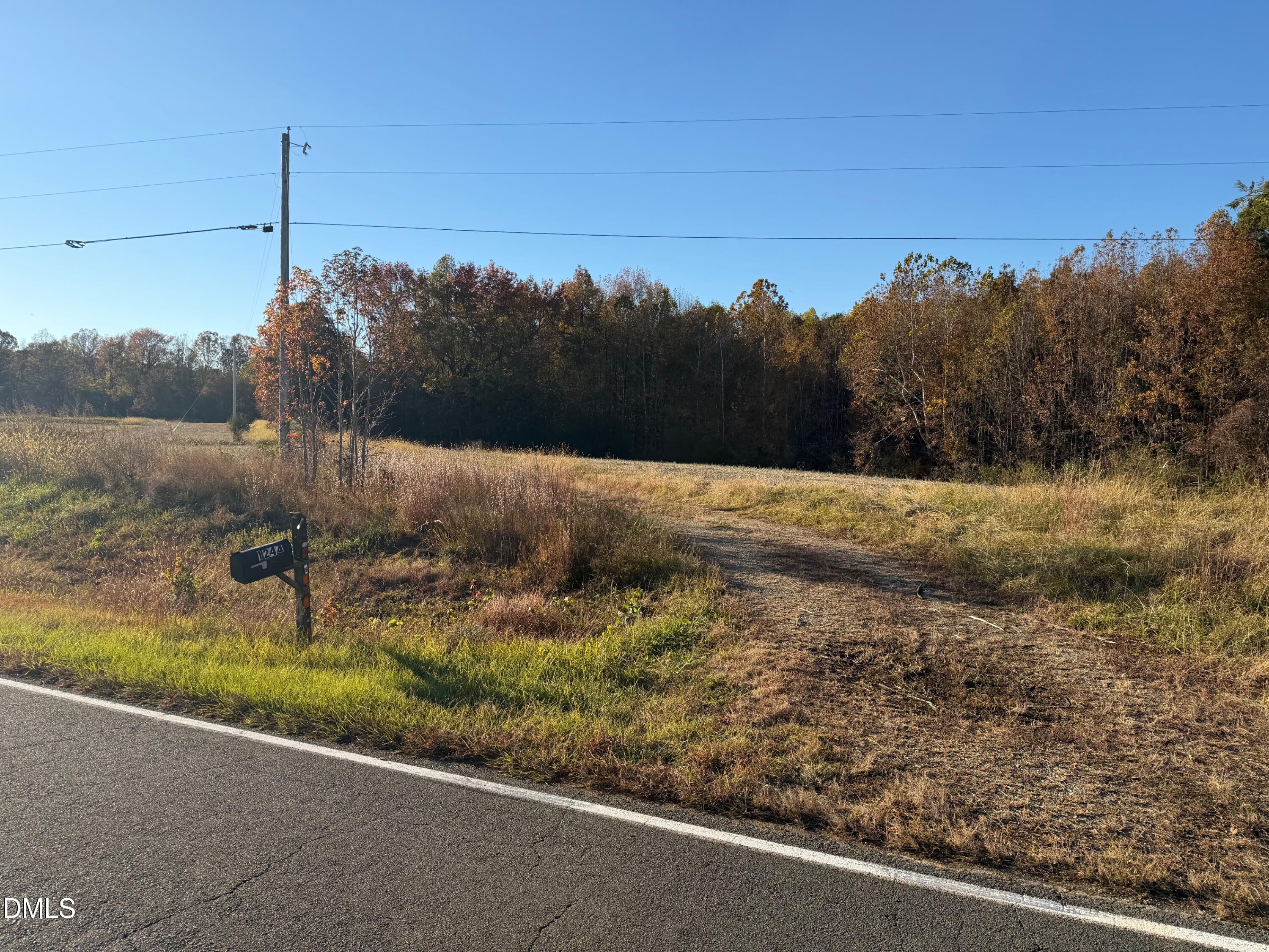 a view of a road with a yard