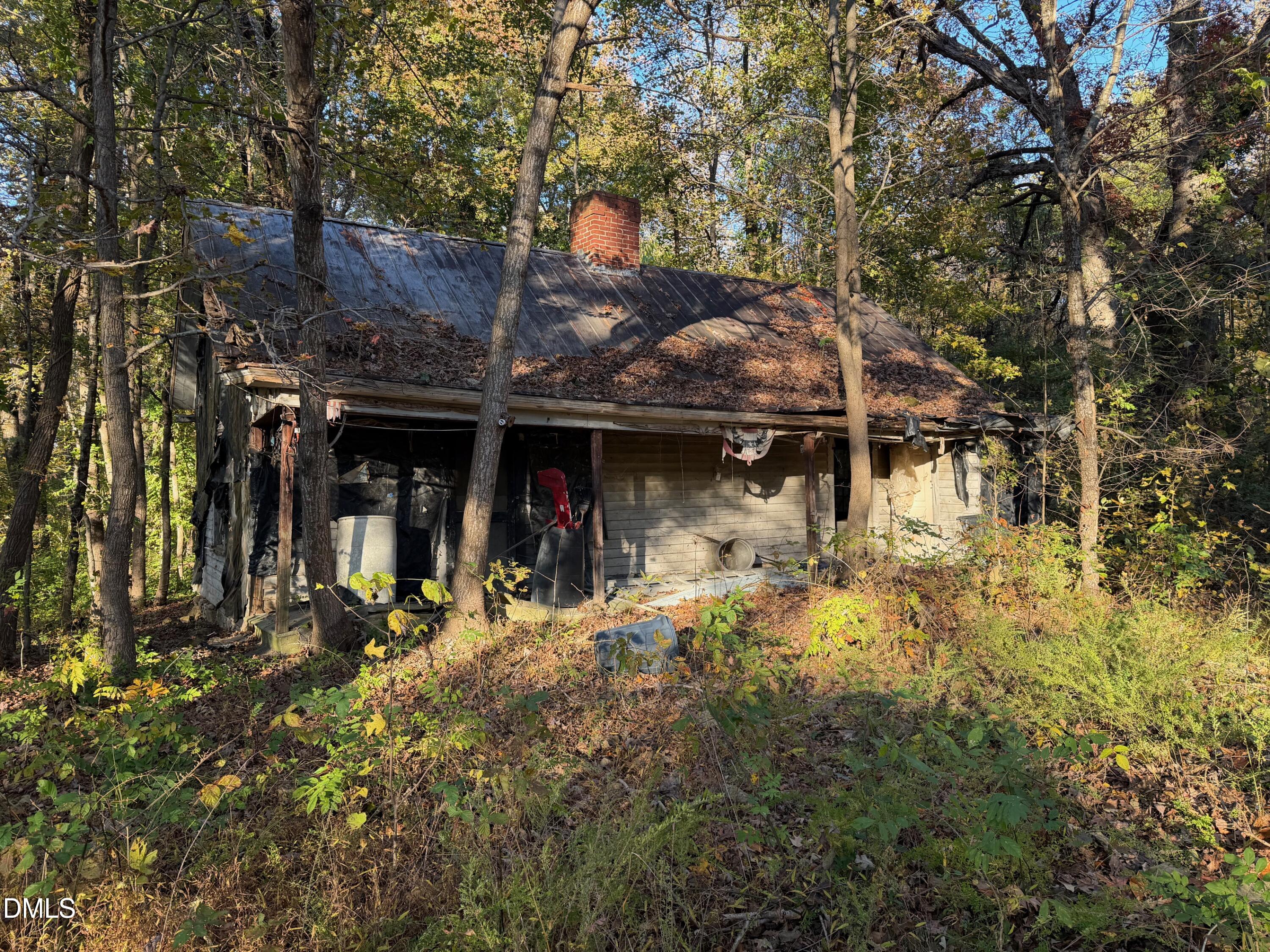 1244 Jones Road Hurdle Mills, NC 27541 - Photo 12 of 17 a view of a chairs in a patio