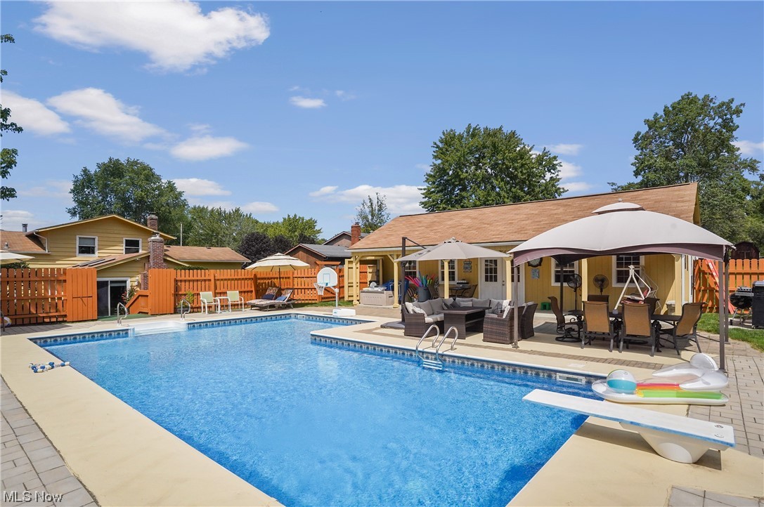 4205 Ellsworth Road Stow, OH 44224 - Photo 35 of 35 View of swimming pool featuring a gazebo, an outdoor living space, and a patio area