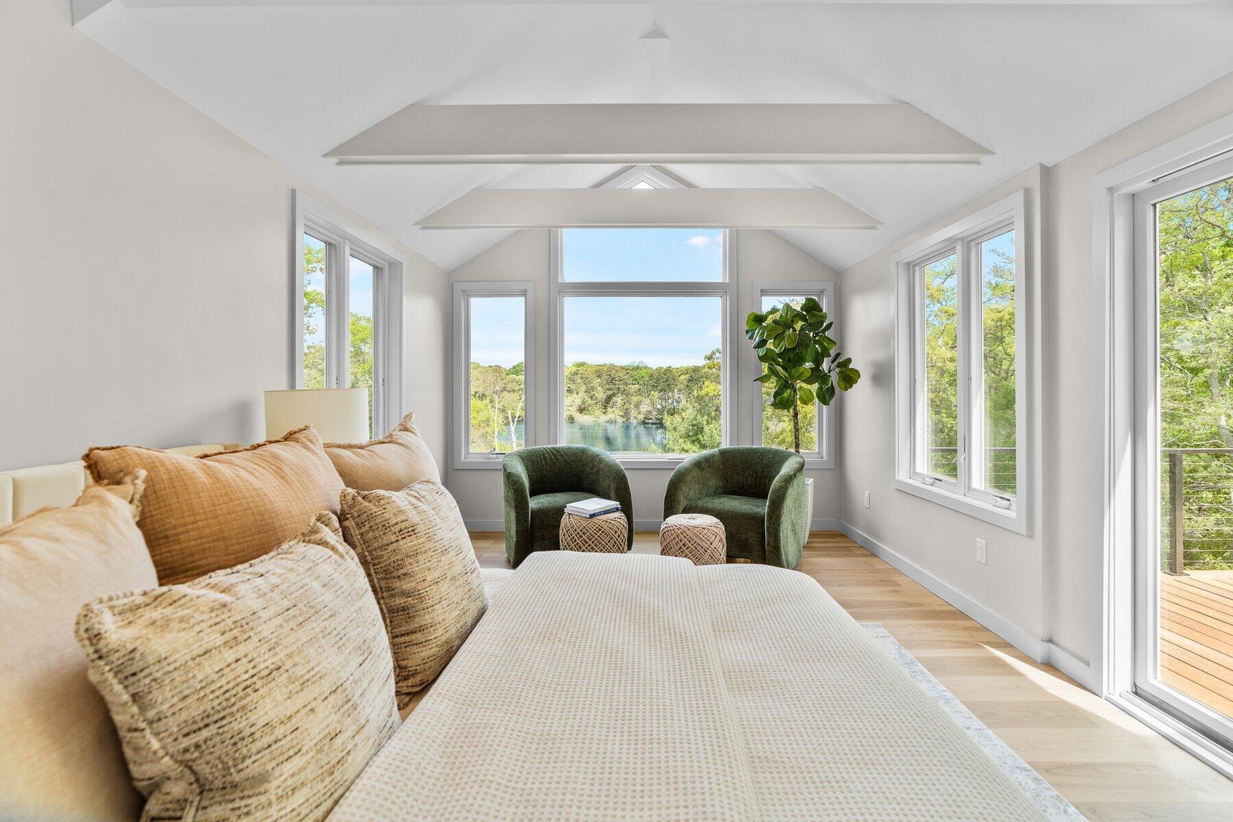 162 Main Street Osterville, MA 02655 - Photo 23 of 50 a living room with furniture and a large window