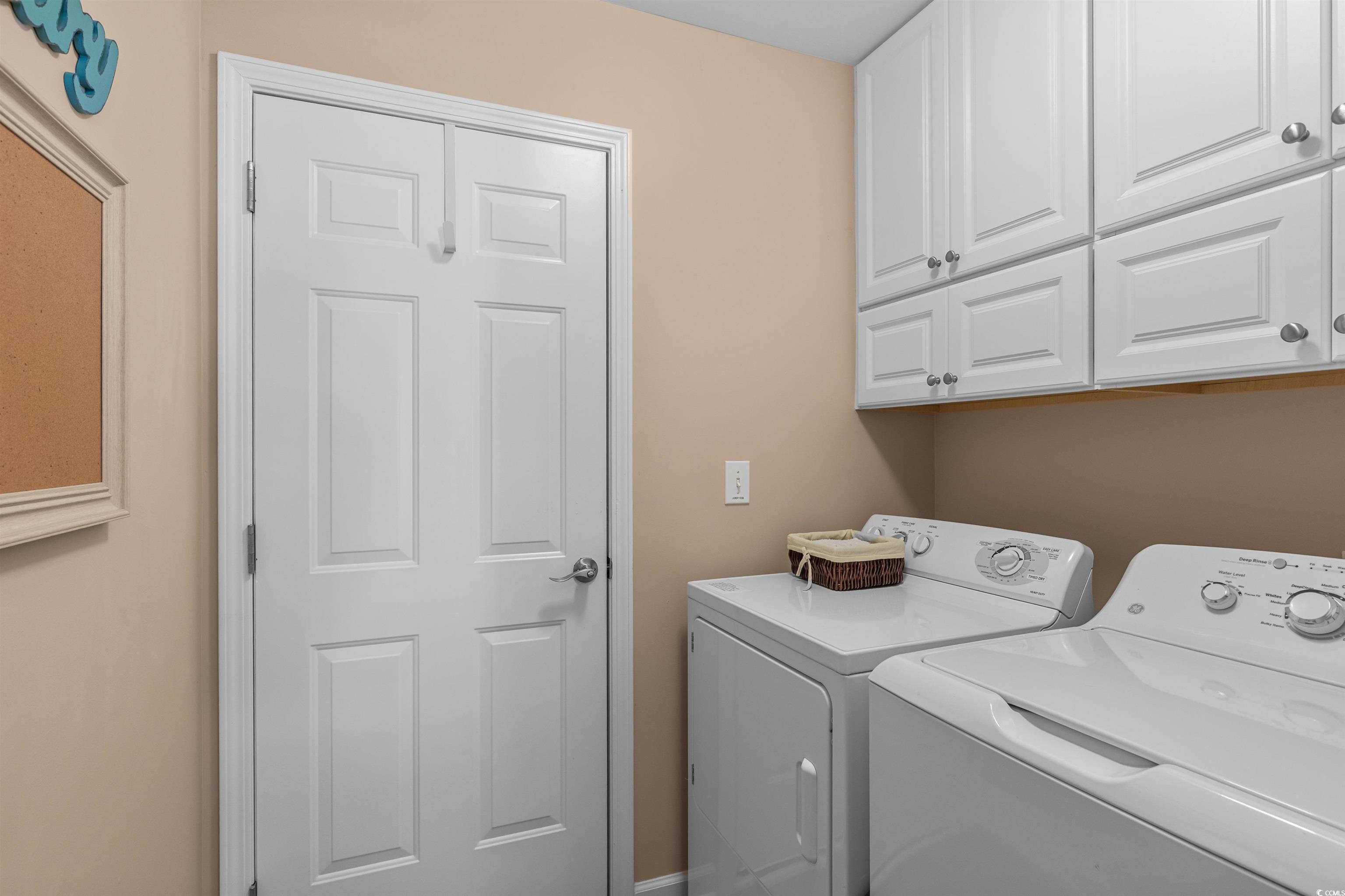3505 Arrowhead Boulevard Myrtle Beach, SC 29579 - Photo 12 of 40 Laundry area with cabinet space and separate washer and dryer