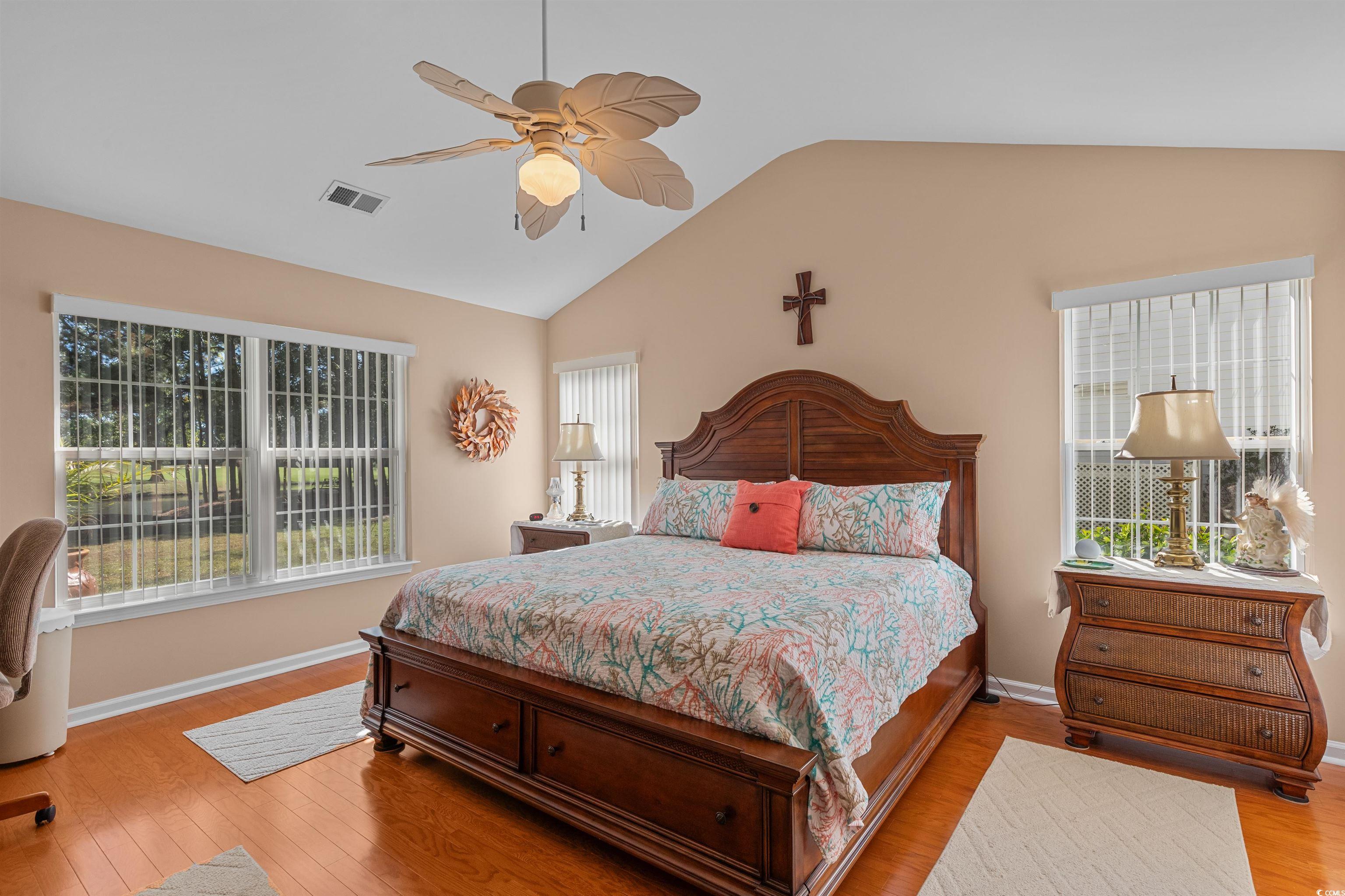 3505 Arrowhead Boulevard Myrtle Beach, SC 29579 - Photo 13 of 40 Bedroom featuring wood finished floors, lofted ceiling, and a ceiling fan