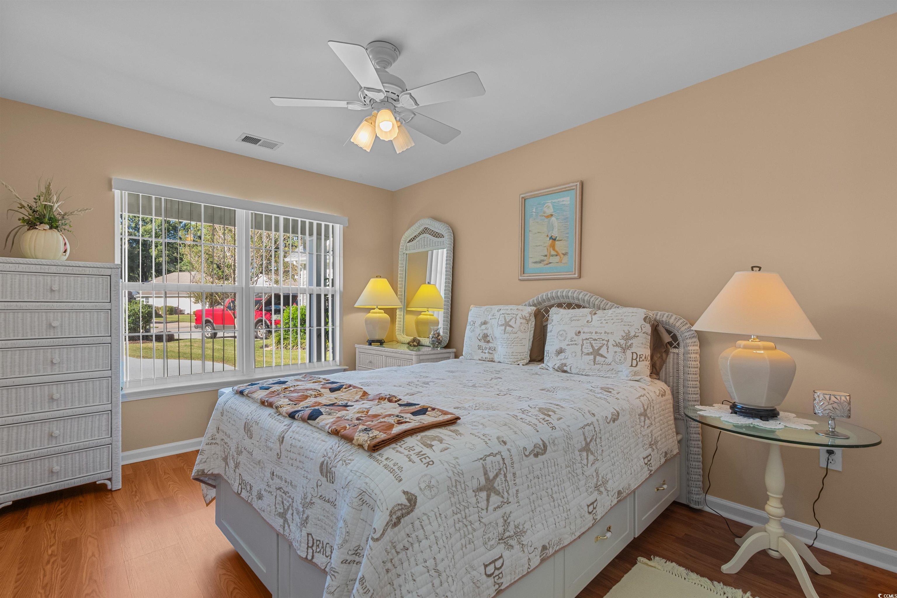3505 Arrowhead Boulevard Myrtle Beach, SC 29579 - Photo 19 of 40 Bedroom with wood finished floors and ceiling fan