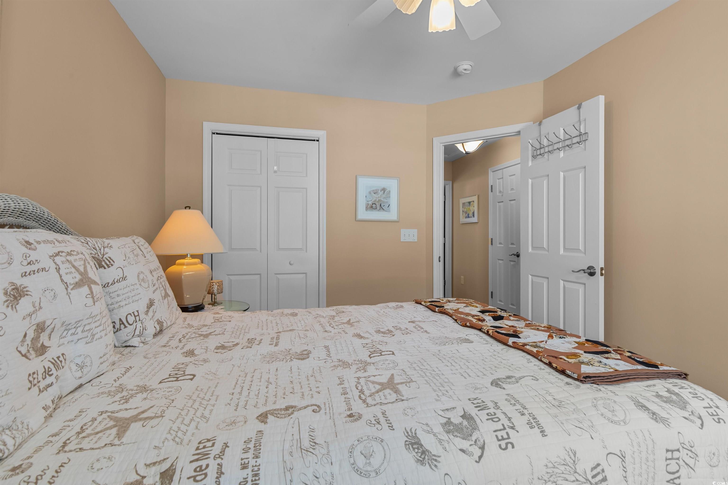 3505 Arrowhead Boulevard Myrtle Beach, SC 29579 - Photo 20 of 40 Bedroom featuring a closet and a ceiling fan