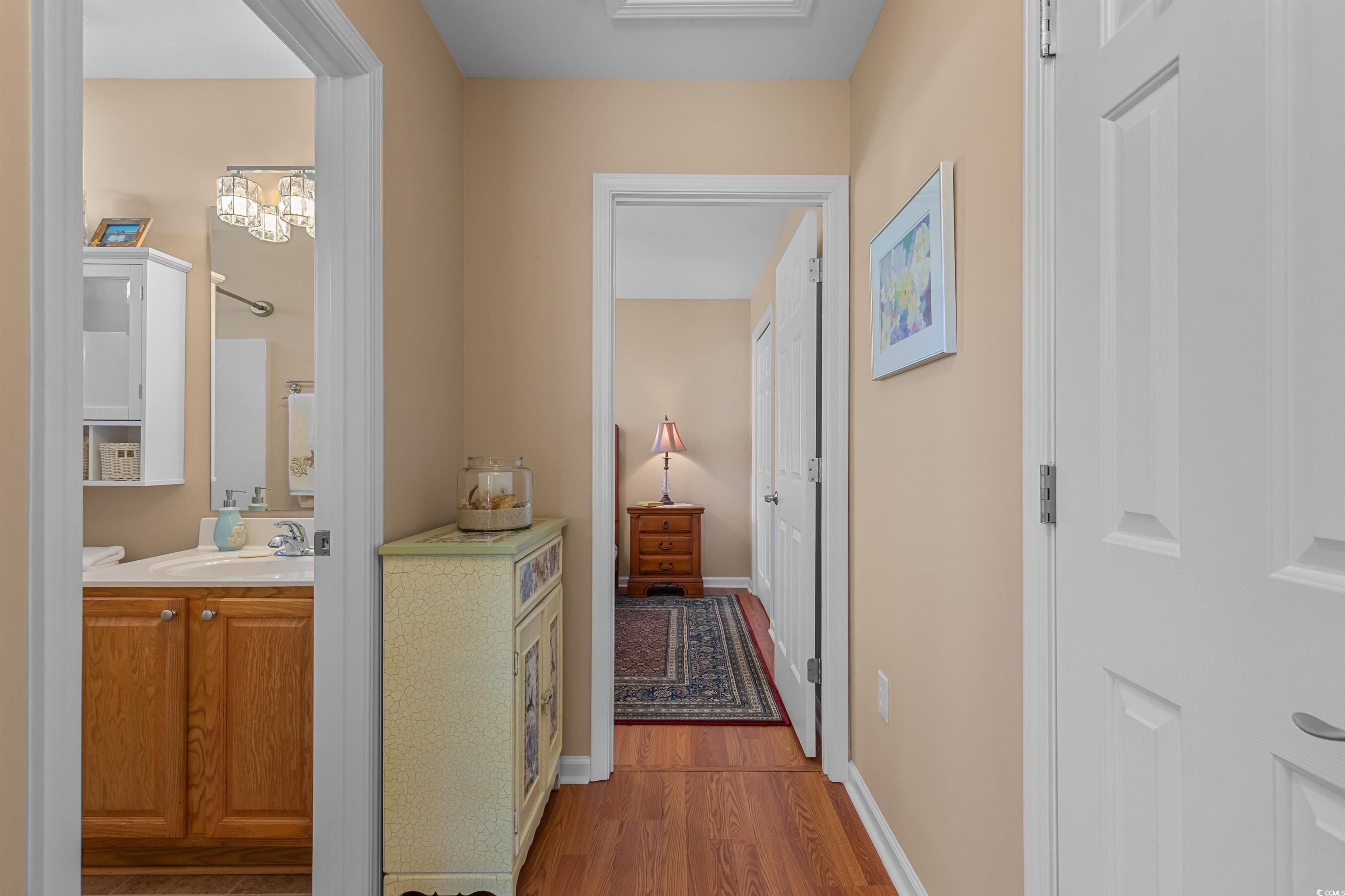 3505 Arrowhead Boulevard Myrtle Beach, SC 29579 - Photo 21 of 40 Hallway with wood finished floors and baseboards