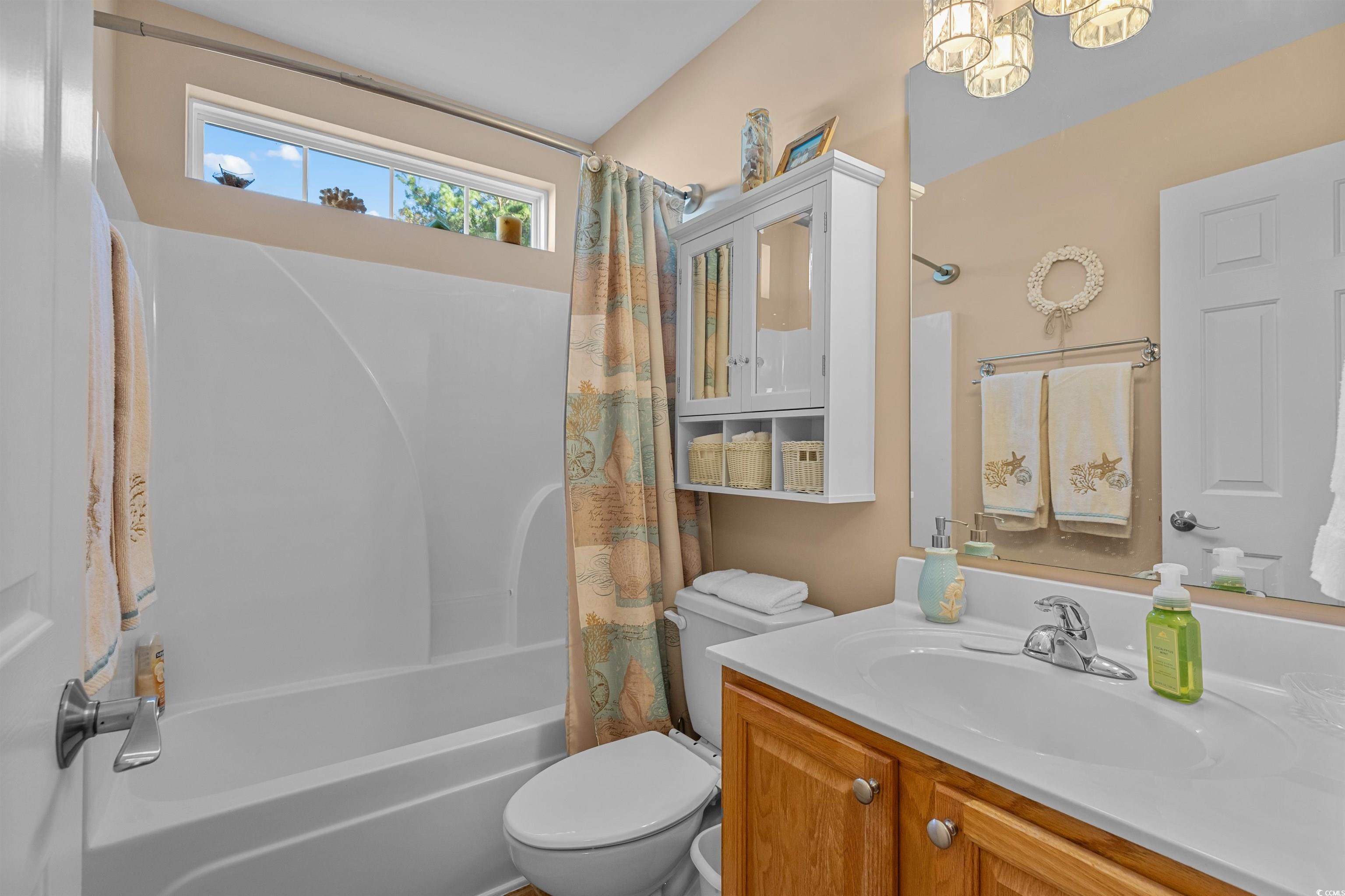 3505 Arrowhead Boulevard Myrtle Beach, SC 29579 - Photo 22 of 40 Full bathroom with vanity and shower / bath combo with shower curtain