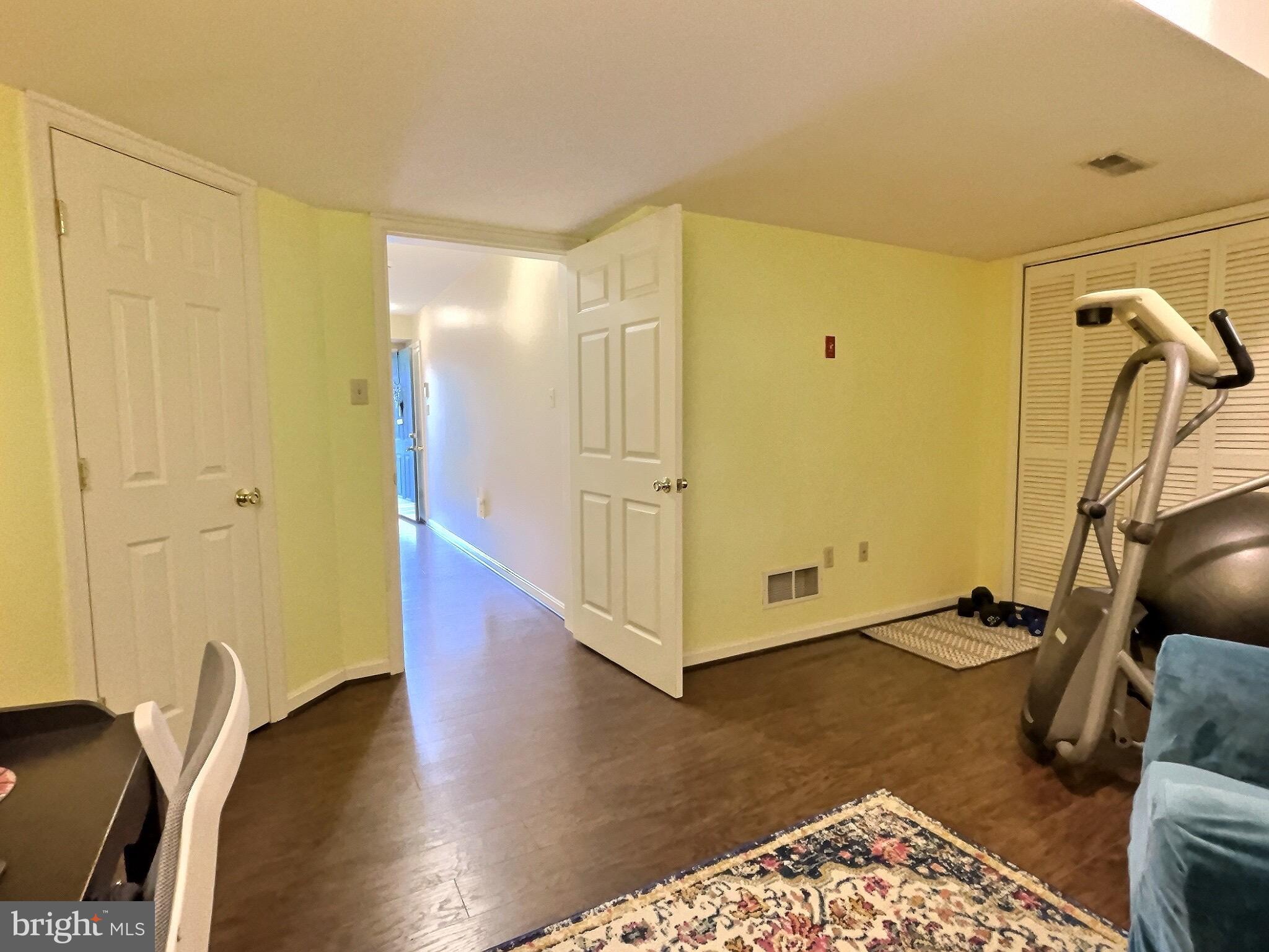 42 Highland Circle Newark, DE 19713 - Photo 16 of 19 a view of a hallway with closet