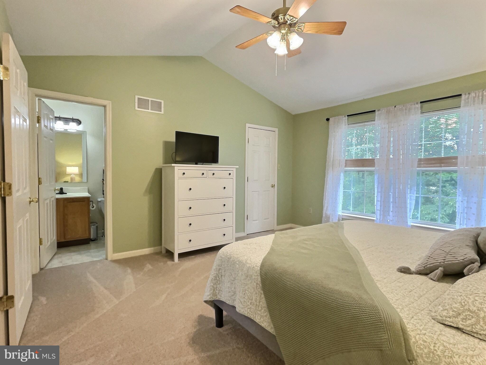 42 Highland Circle Newark, DE 19713 - Photo 9 of 19 a bedroom with a bed and a television