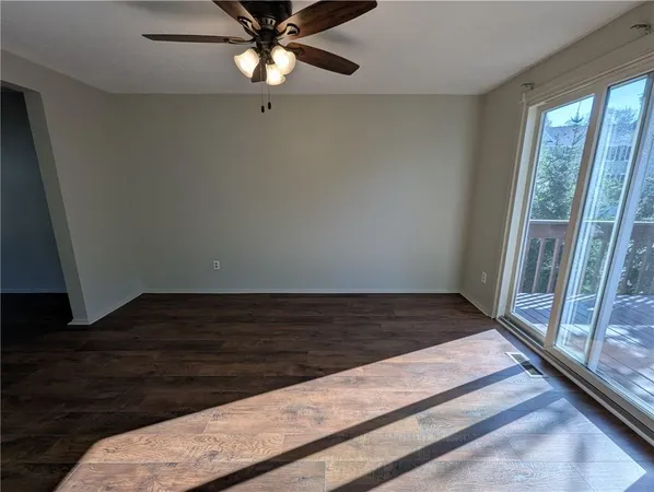 a view of an empty room and window