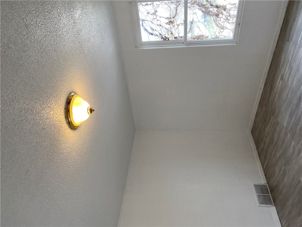 175 Rita Street Dayton, OH 45404 - Photo 34 of 48 Bright interior space features textured walls, sleek flooring, and ample natural light.