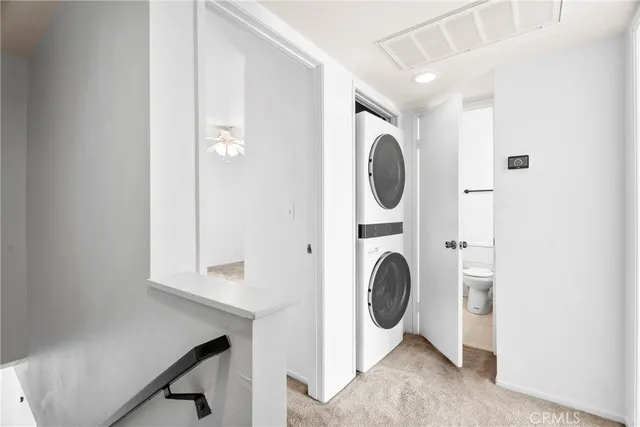 a view of a room with washer and dryer
