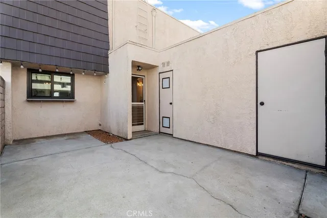 a view of a room with a hallway