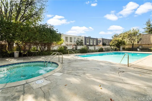 a view of a park with large trees
