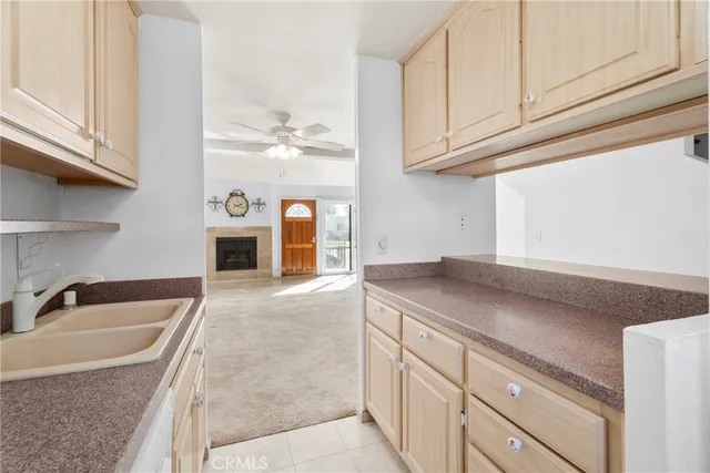 a kitchen with stainless steel appliances granite countertop a sink and dishwasher