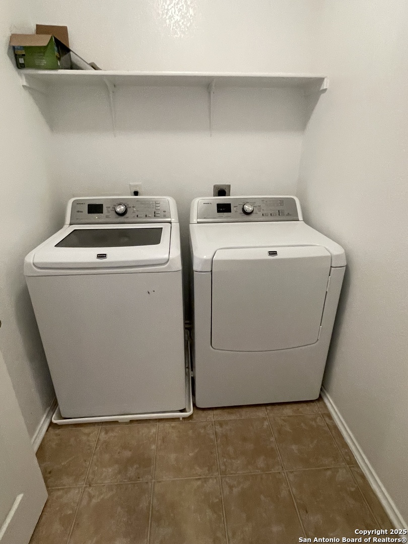 11111 Denae Drive Live Oak, TX 78233 - Photo 32 of 43 a utility room with dryer and washer