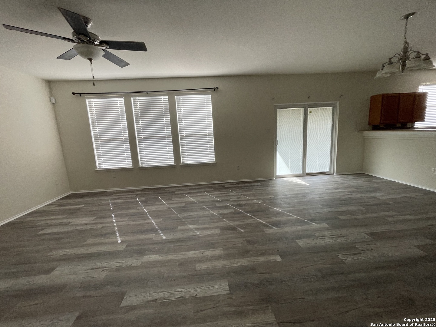 11111 Denae Drive Live Oak, TX 78233 - Photo 6 of 43 a view of an empty room with a window