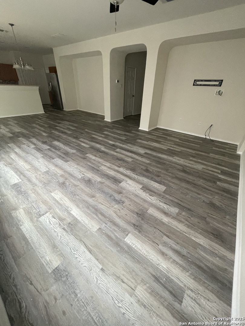 11111 Denae Drive Live Oak, TX 78233 - Photo 7 of 43 a view of empty room with wooden floor