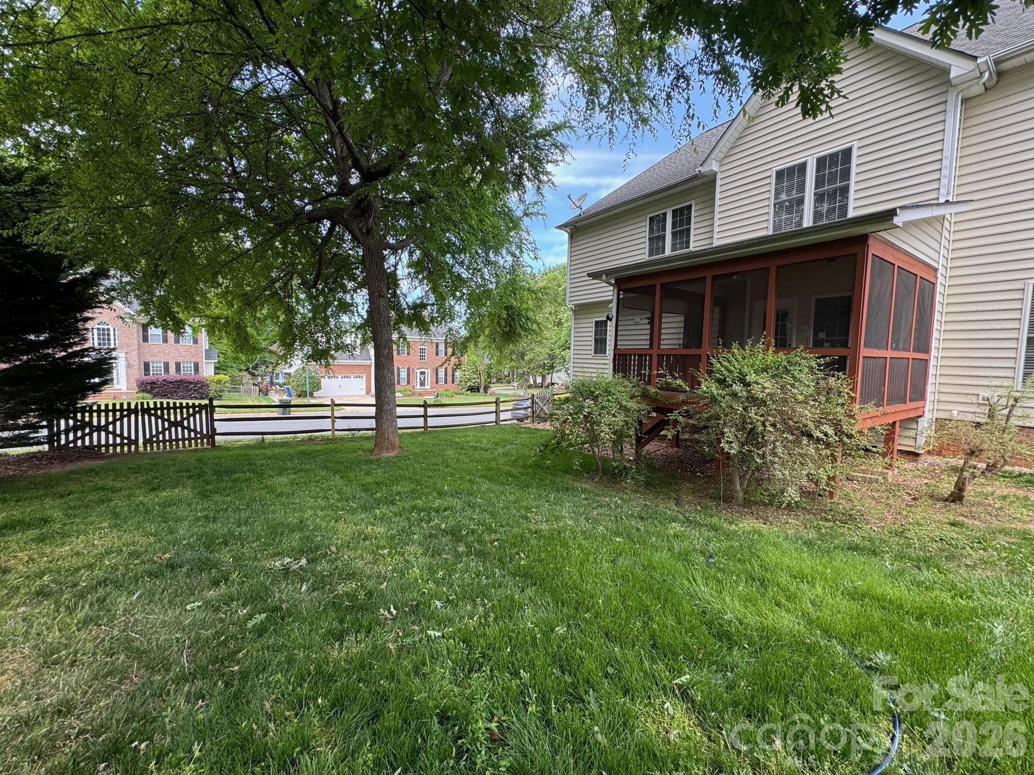 16905 Laureate Road, Unit 16 Huntersville, NC 28078 - Photo 6 of 38 a view of a house with a yard and sitting area