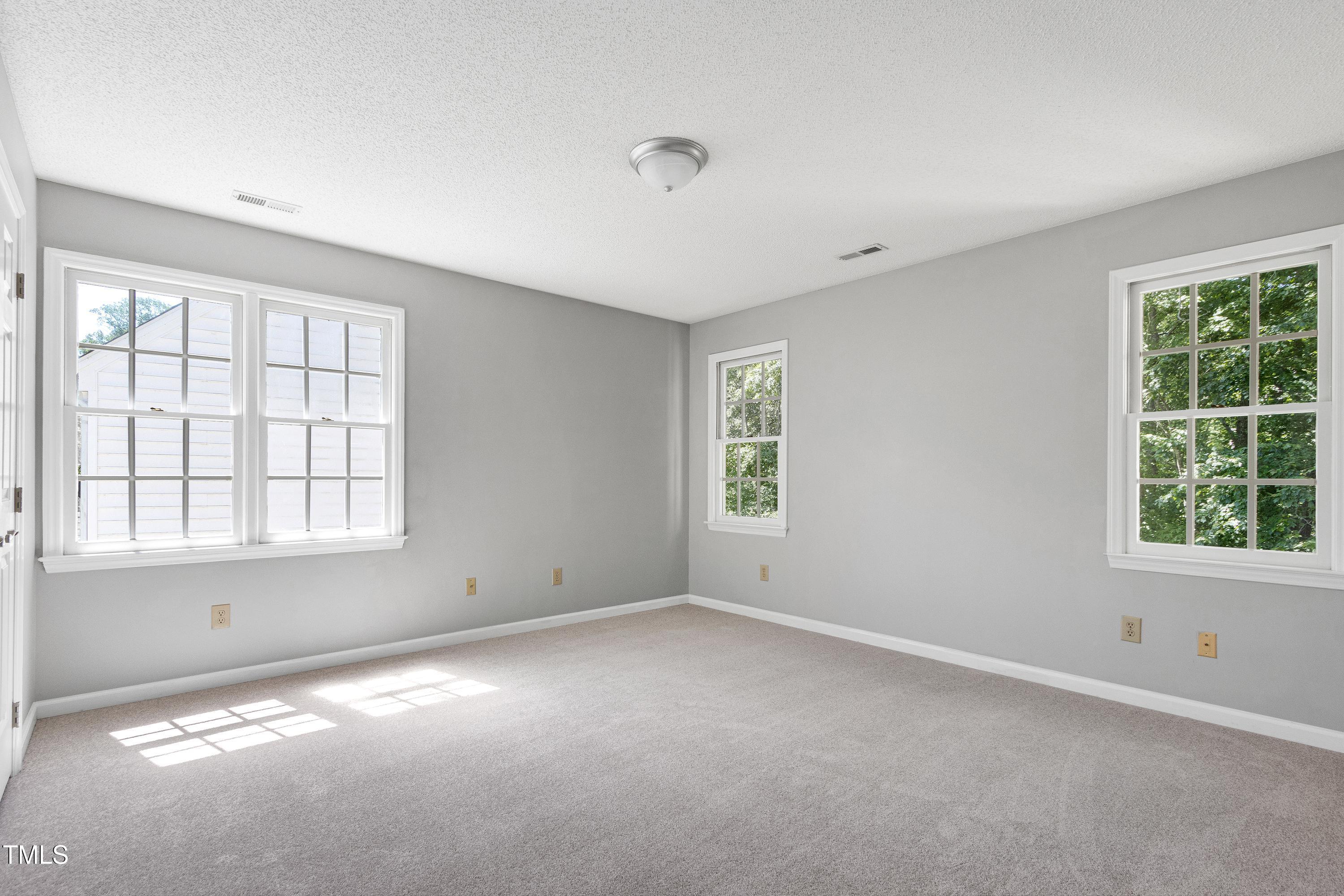 300 Silvercliff Trail Cary, NC 27513 - Photo 19 of 27 an empty room with a window
