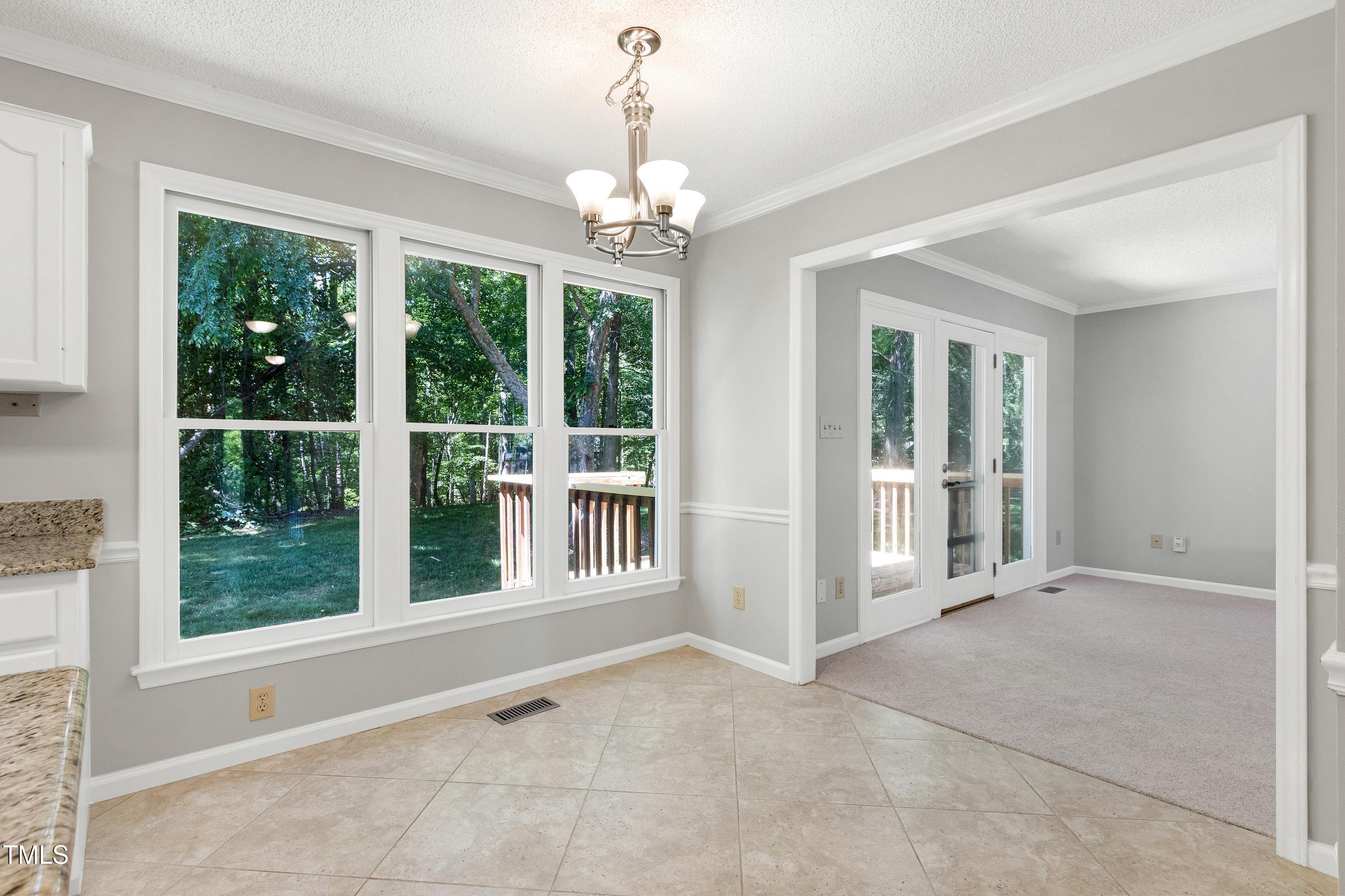 300 Silvercliff Trail Cary, NC 27513 - Photo 8 of 27 a view of an empty room with a window