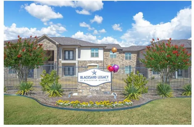 a view of city with ocean