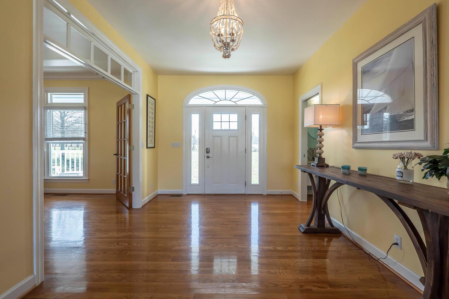 1438 Kittrell Road Franklin, TN 37064 - Photo 3 of 30 Foyer showing hardwoods with access to Dining Room and Powder room