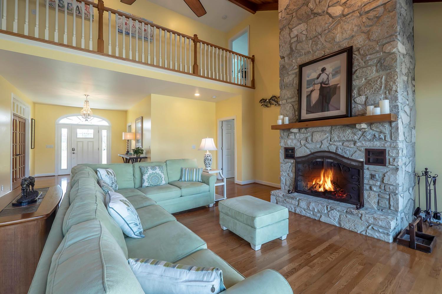 1438 Kittrell Road Franklin, TN 37064 - Photo 5 of 30 Open 2 story Living room showing wood burning Fireplace