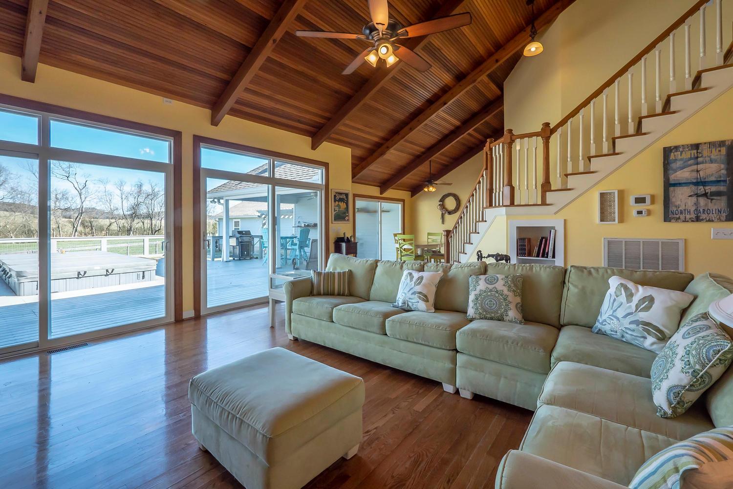 1438 Kittrell Road Franklin, TN 37064 - Photo 6 of 30 another view of Living room showing view of large deck and backyard