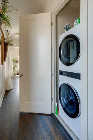 a view of a hallway with washer and dryer