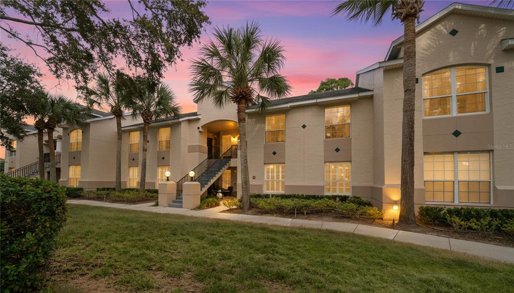 705 Augusta Circle, Unit 705 St. Augustine, FL 32086 - Photo 1 of 53 a front view of a house with garden