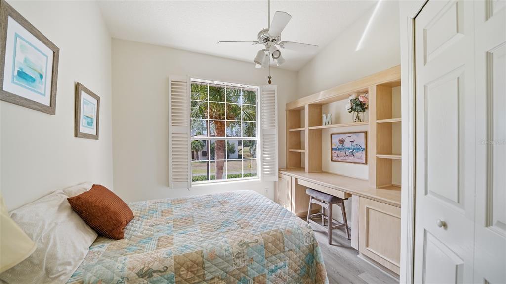705 Augusta Circle, Unit 705 St. Augustine, FL 32086 - Photo 28 of 53 a bedroom with a bed and a window