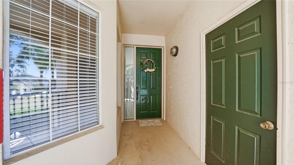 705 Augusta Circle, Unit 705 St. Augustine, FL 32086 - Photo 34 of 53 a view of a door and a window