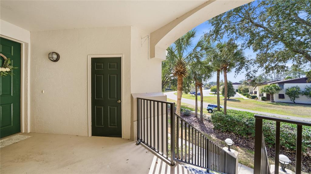 705 Augusta Circle, Unit 705 St. Augustine, FL 32086 - Photo 36 of 53 a view of a house with backyard and trees