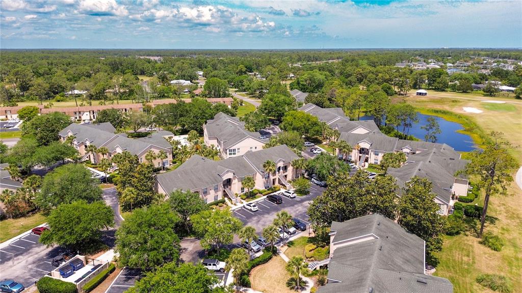705 Augusta Circle, Unit 705 St. Augustine, FL 32086 - Photo 50 of 53 an aerial view of residential houses with outdoor space