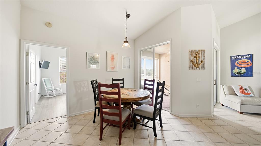 705 Augusta Circle, Unit 705 St. Augustine, FL 32086 - Photo 9 of 53 a view of a dining room with furniture
