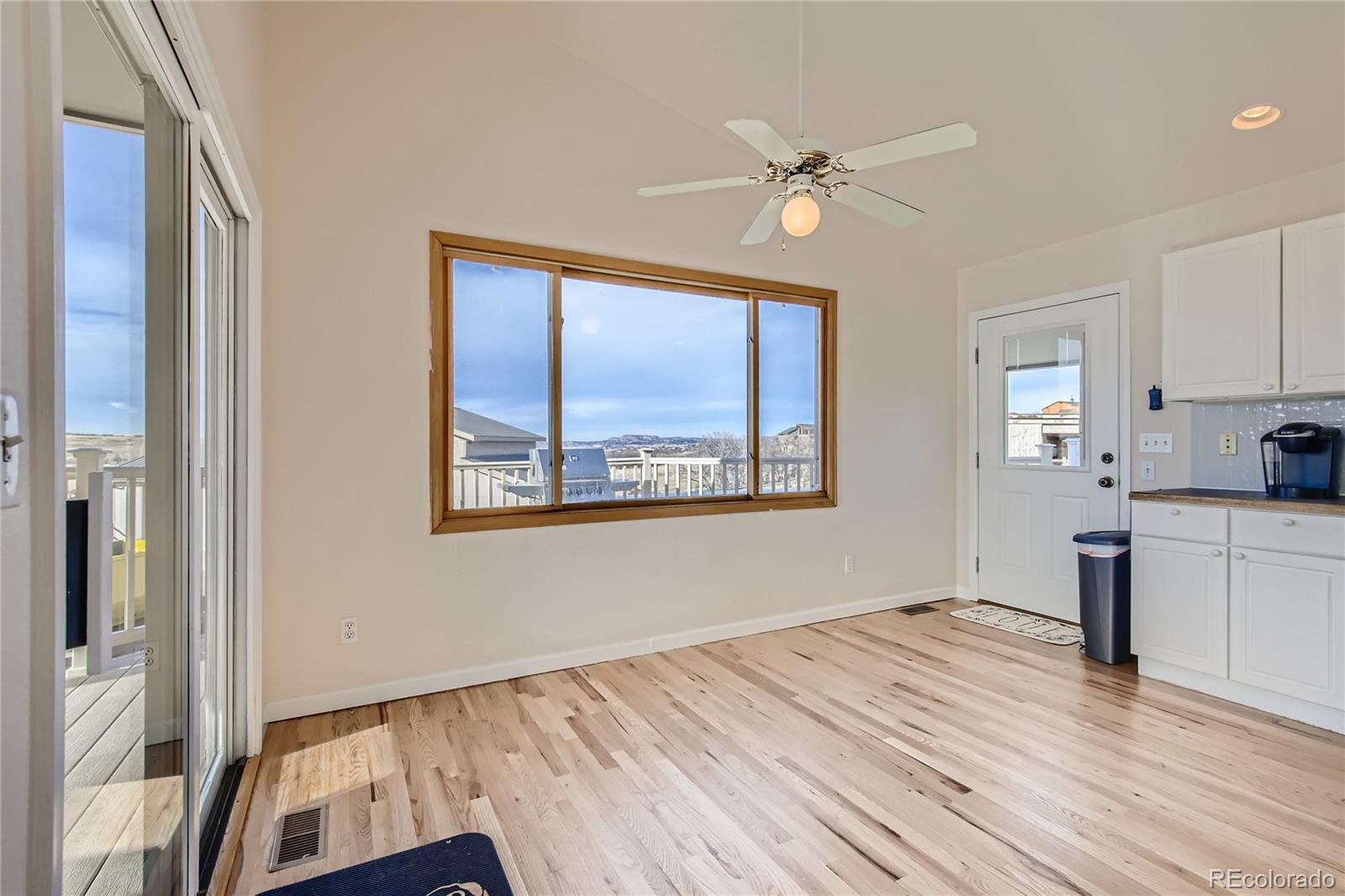 3961 Bear Canyon Circle Sedalia, CO 80135 - Photo 12 of 40 a bedroom with a large bed and a window