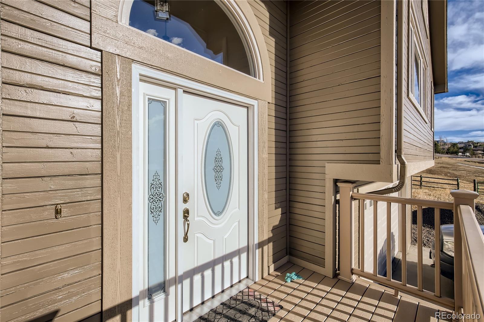3961 Bear Canyon Circle Sedalia, CO 80135 - Photo 3 of 40 a view of a door of a house with a door