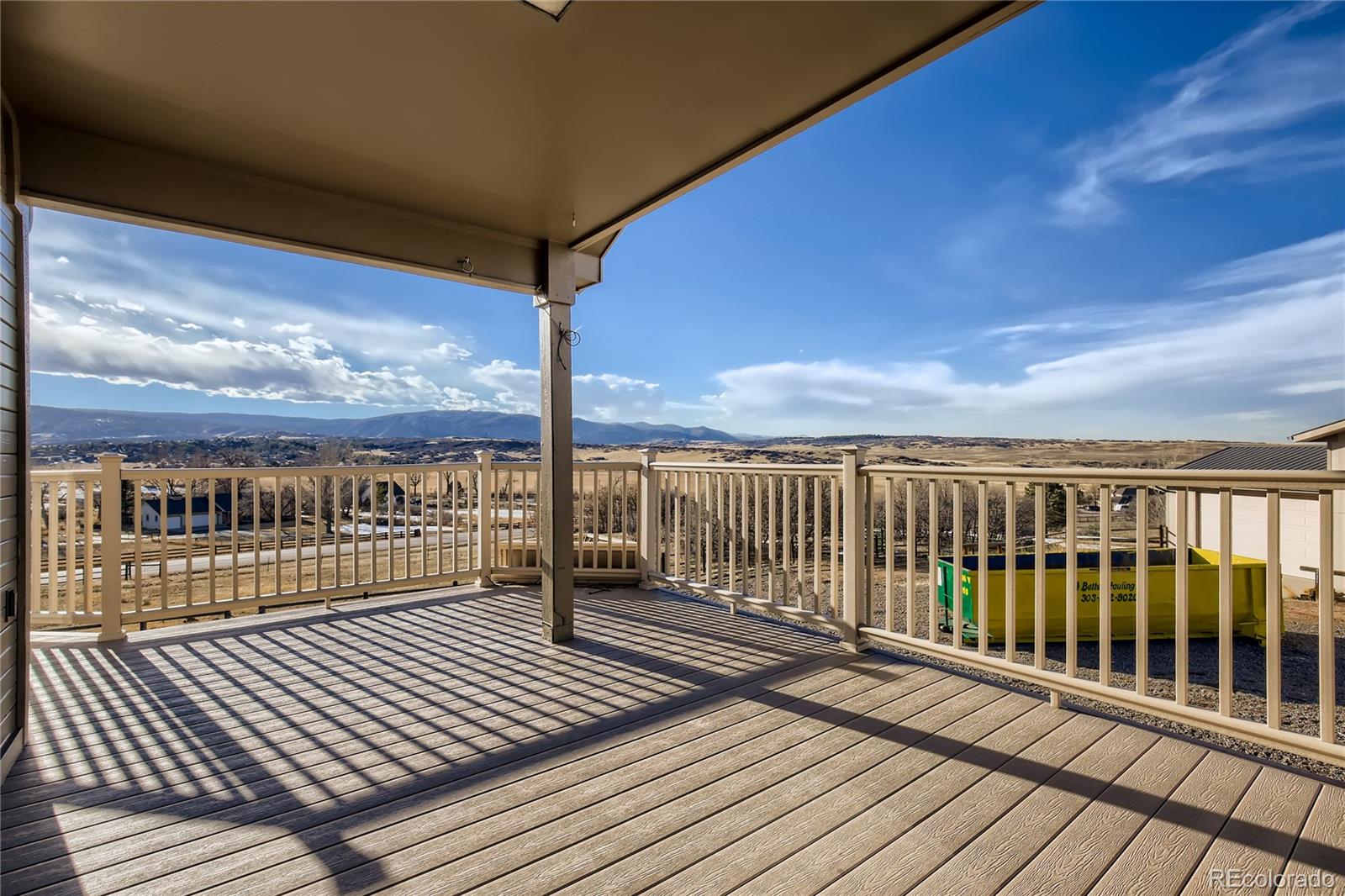 3961 Bear Canyon Circle Sedalia, CO 80135 - Photo 33 of 40 a view of balcony with wooden floor