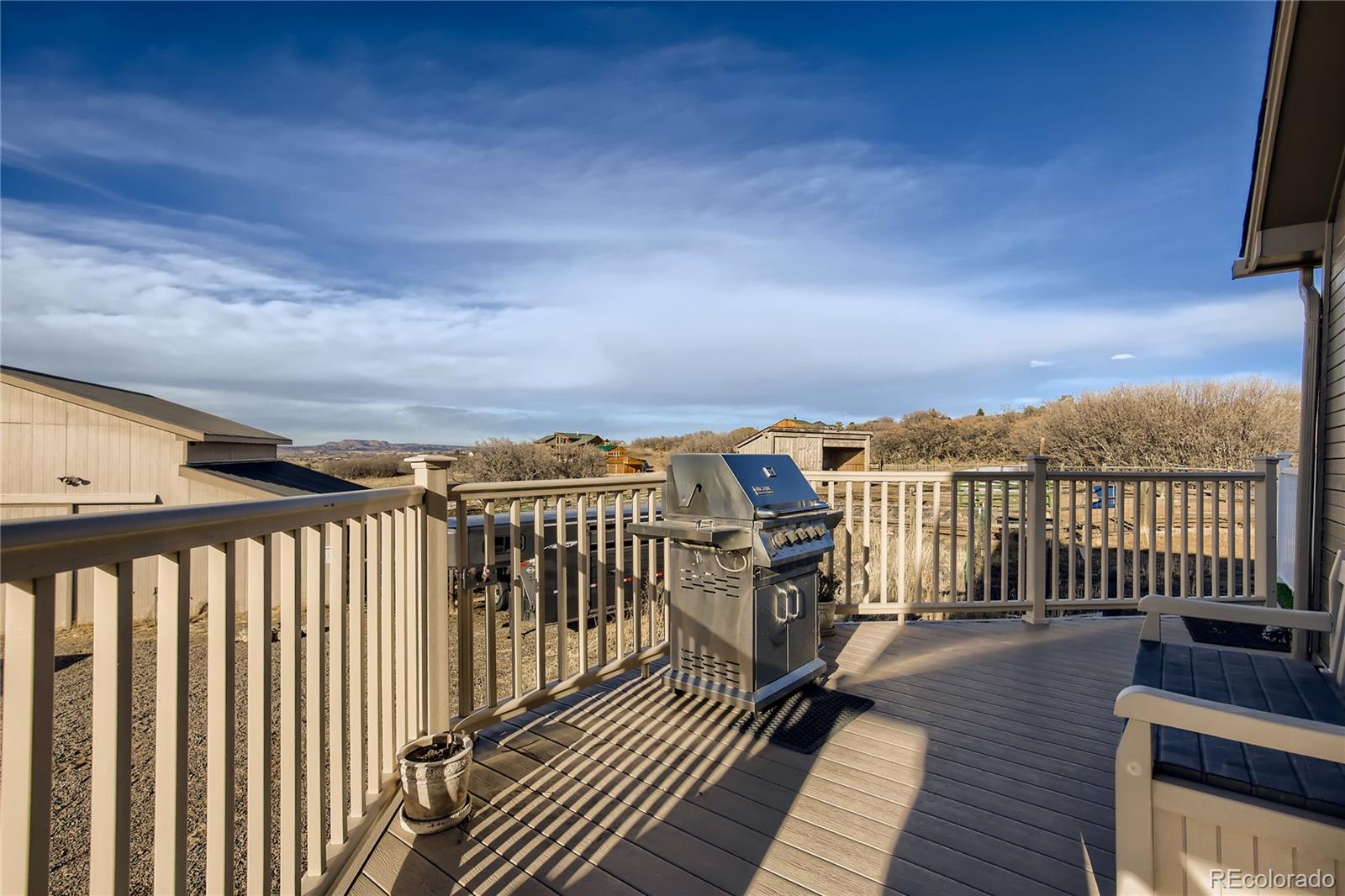3961 Bear Canyon Circle Sedalia, CO 80135 - Photo 34 of 40 a view of balcony with wooden floor