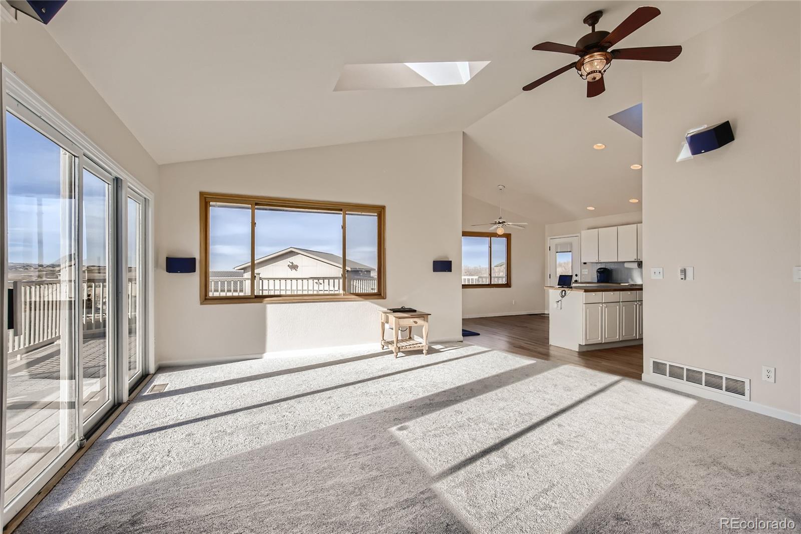 3961 Bear Canyon Circle Sedalia, CO 80135 - Photo 4 of 40 a bedroom with a bed and a large window