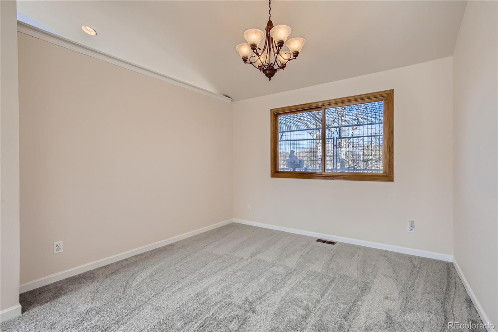 3961 Bear Canyon Circle Sedalia, CO 80135 - Photo 6 of 40 a view of empty room with window