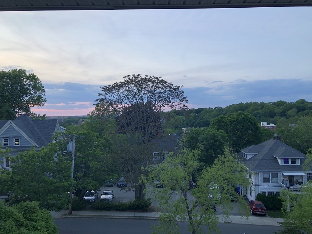 16 Addington Road, Unit 46 Brookline, MA 02445 - Photo 5 of 24 a view of a city with a building in the background