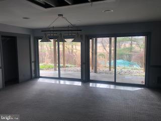 11067 Gaither Farm Road Ellicott City, MD 21042 - Photo 18 of 24 Lower level clubroom leading to patio.