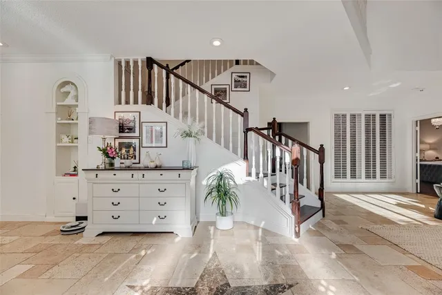 a view of entryway with stairs and furniture