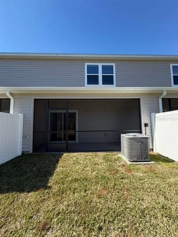 a house view with a backyard space