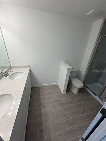 a bathroom with a sink and a vanity